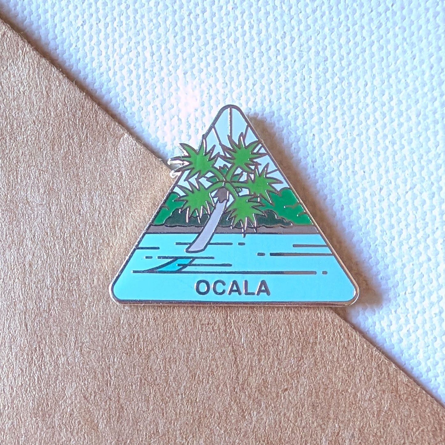 Ocala National Forest Pin featuring a tree in clear blue waters of Silver Glen Springs.