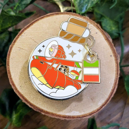 Italian pig pilot with sunglasses flying a red italian plane in a bottle enamel pin