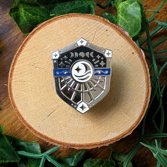 White and Blue Moon Shield Blue Glow Silver Enamel Pin