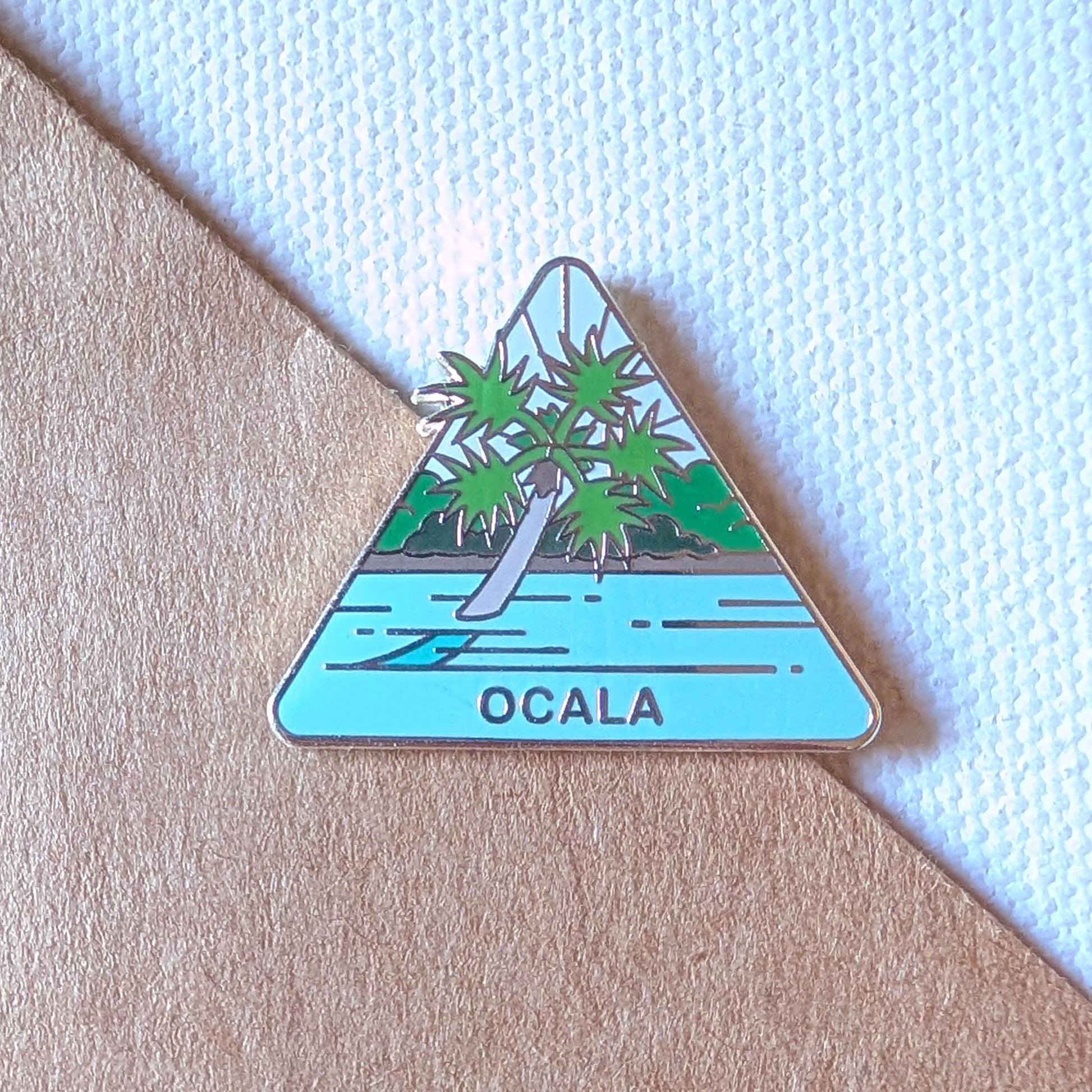 Ocala National Forest Pin featuring a tree in clear blue waters of Silver Glen Springs.