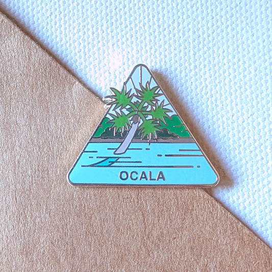 Ocala National Forest Pin featuring a tree in clear blue waters of Silver Glen Springs.