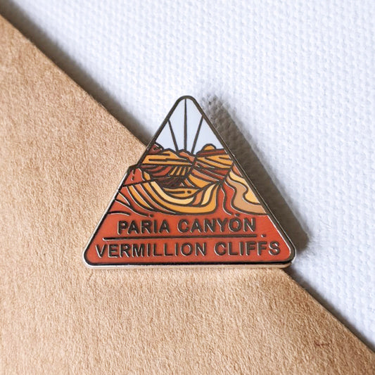 Paria Canyon-Vermillion Cliffs enamel pin design features the Coyote Buttes North famously known as The Wave.