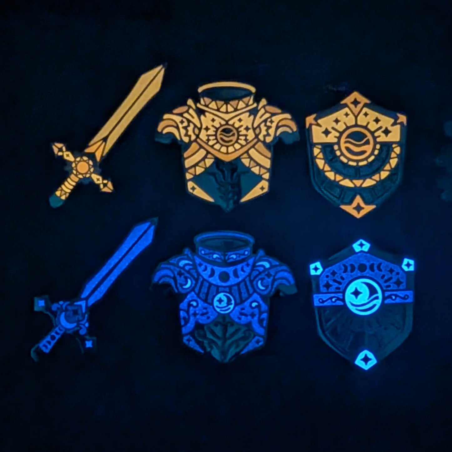 Glowing metallic swords and armor pieces on a dark background
