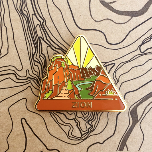 Triangle Zion national park enamel pin featuring a view of Angels Landing.