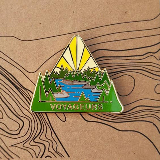 Triangle Voyageurs national park enamel pin featuring a view of waterways found throughout the park.